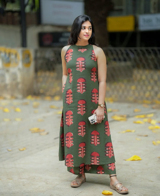 Green Sleeveless Printed Maxi Dress with Red Abstract Motifs