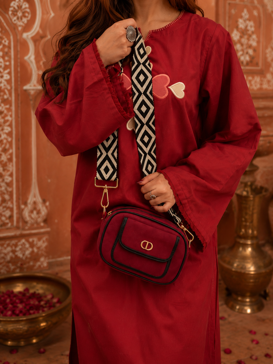 red cotton kurta featuring heart embroidery and premium sleeve detailing
