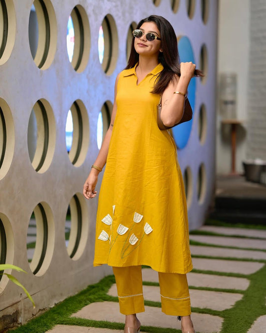 Yellow embroidered Kurta with Trousers